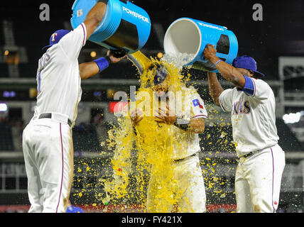 Arlington, Texas, USA. 20th April, 2016. Texas Rangers second baseman Rougned Odor #12 is showered by Texas Rangers shortstop Elvis Andrus #1 (left) and Texas Rangers shortstop Hanser Alberto #2 (right) after an MLB game between the Houston Astros and the Texas Rangers during the Silver Boot Series at Globe Life Park in Arlington, TX Texas defeated Houston 2-1. Credit:  Cal Sport Media/Alamy Live News Stock Photo