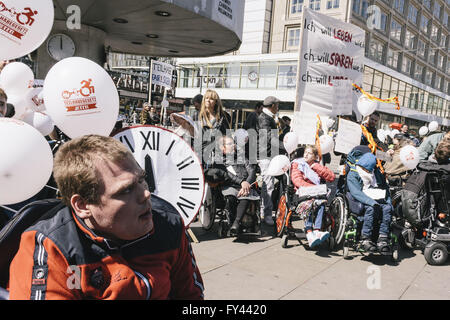 Berlin, Berlin, Germany. 21st Apr, 2016. Demonstrators during the protest of disability rights activists in front of the world clock on Alexanderplatz in Berlin. The protesters ask for a full implementation of the Disability Rights Convention of the United Nations as part of the promised federal participation law and support for assistance and domestic care regardless of income. Credit:  Jan Scheunert/ZUMA Wire/Alamy Live News Stock Photo