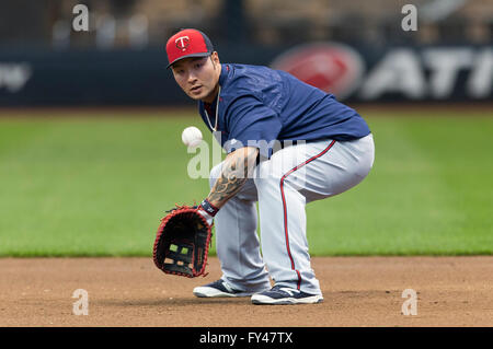 Minnesota Twins' Byung Ho Park flips his bat in the air after striking ...