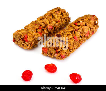 Muesli bars with sunflower seeds, nuts and dried cherries Stock Photo