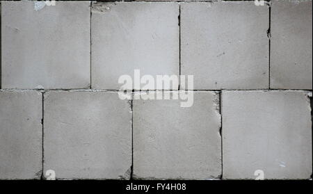 Wall made from concrete blocks usable as background or texture. Stock Photo