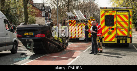 Road accident, fire engine, ambulance, police, overturned car, audi Stock Photo