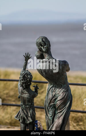 Anita Lafford's 'The Welcome Home Statue' on the seafront promenade at Fleetwood, Lancashire, UK Stock Photo