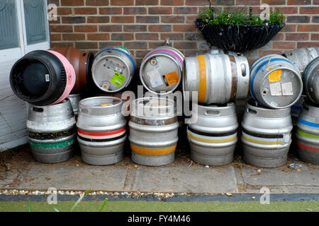 metal beer barrels stacked up outside of a pub in england uk Stock Photo