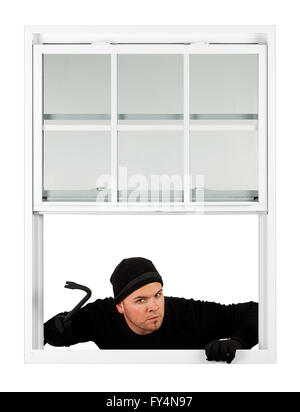 Series with Caucasian male as a burglar or thief, sneaking in a window, carrying stolen goods, etc.  Isolated on white backgroun Stock Photo