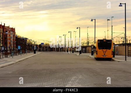 Trelleborg, Sweden - April 12, 2016: Morning light at the bus terminal. Only one bus is in and there are no people getting on or Stock Photo