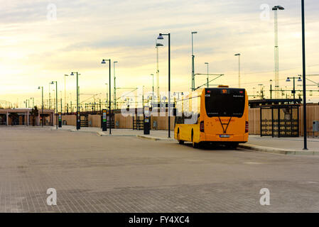 Trelleborg, Sweden - April 12, 2016: Morning light at the bus terminal. Only one bus is in and there are no people getting on or Stock Photo