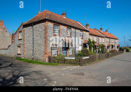 row of traditional flint cottages, upper sheringham, north norfolk, england Stock Photo