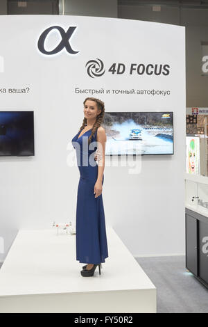 Moscow Crocus Expo, Moscow, Russia - April 15, 2016: Girl model representing Sony digital cameras at Photoforum 2016 Stock Photo