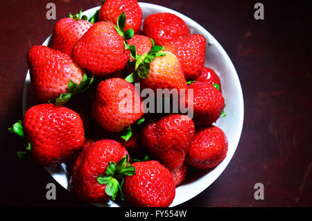 Strawberries in wood bowl Stock Photo