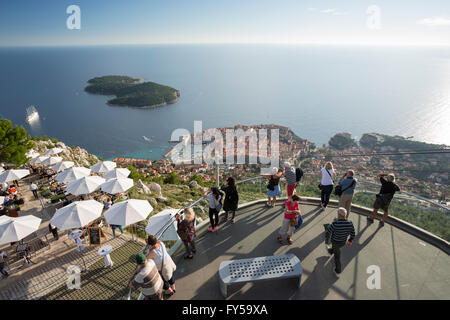 People enjoying the view of Dubrovnik and Lokrum Island from the viewing platform on Mount Srd, Brdo Srd, Dubrovnik, Croatia Stock Photo