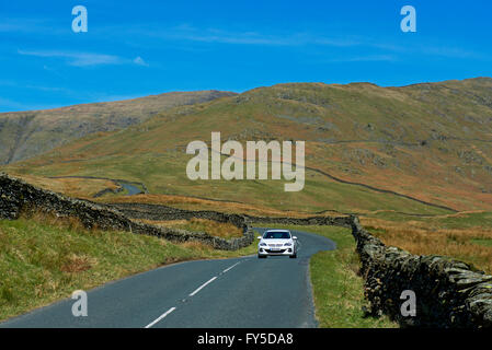 Car on Kirkstone Pass (A592), Lake District National Park, Cumbria ...