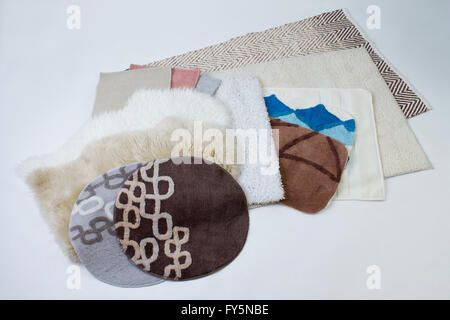 Many kinds of carpet showing on the white background Stock Photo