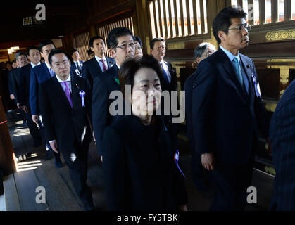 Tokyo, Japan. 22nd Apr, 2016. Japanese lawmakers visit Yasukuni Shrine in Tokyo, capital of Japan, on April 22, 2016. A group of around 90 Japanese lawmakers, including a senior member of Prime Minister Shinzo Abe's Cabinet, on Friday visited the controversial war-linked Yasukuni Shrine which stands as a symbol of Japan's militarism and honors its war dead including criminals convicted by an international tribunal. © Ma Ping/Xinhua/Alamy Live News Stock Photo