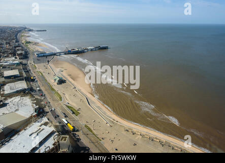 Blackpool, Lancashire, UK. 22nd April, 2016. For the 4th day in a row, Blackpool, Lancashire has basked under continuous sunshine and blue skies that has seen the temperatures in this world famous holiday resort in the North West of England, soar to 20 degrees - as warm as the Mediterranean. This is the view of the resort from the top of the iconic Blackpool Tower which is a heady, 158 metres from the ground. Blackpool, Lancashire, UK Credit:  Barrie Harwood/Alamy Live News Stock Photo