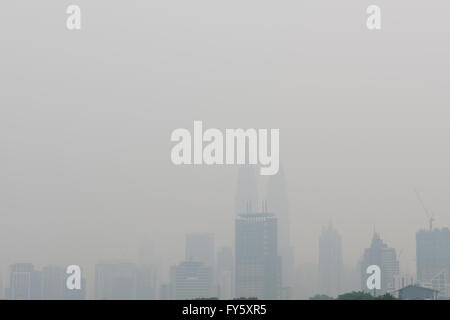 Kuala Lumpur, Malaysia. 22nd April, 2016. Earth Day. Malaysia’s iconic Petronas Twin Towers are seen cloaked in haze in Kuala Lumpur on April 22 2016 Credit:  Chris JUNG/Alamy Live News Stock Photo