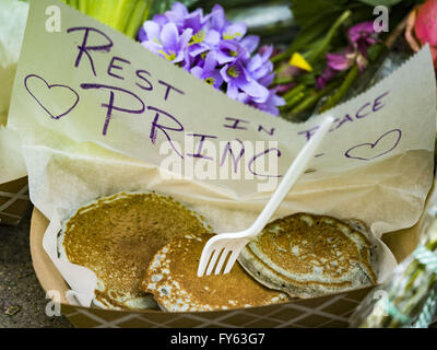 Minneapolis, MN, USA. 22nd Apr, 2016. Pancakes left at a memorial for Prince in front of 1st Ave in Minneapolis. Prince was known to serve pancakes to guests at the all night dance parties in his Chanhassen home and ate pancakes during a guest appearance on the American TV show ''New Girl.'' Thousands of people came to 1st Ave in Minneapolis Friday to mourn the death of Prince, whose full name is Prince Rogers Nelson. 1st Ave is the nightclub the musical icon made famous in his semi autobiographical movie ''Purple Rain.'' Prince, 57 years old, died Thursday, April 21, 2016, at Pais