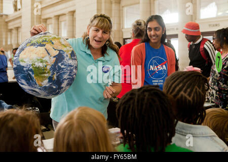 Washington DC, USA. 22nd Apr, 2016. NASA celebrates Earth day with the public in the Main Hall of Union Station in Washington, DC. Many scientists, astrophysicists, and astronaut Dr. Piers Sellers presented latest space and earth science studies and technologies, and shared stories of their experience working with NASA. Credit:  B Christopher/Ģ����ý Live News Stock Photo