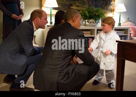 London, UK. 22nd Apr, 2016. U.S President Barack Obama is introduced to Prince George in his bathrobe and pajamas as his parents, Prince William, the Duke of Cambridge and Kate Middleton, Duchess of Cambridge look on at Kensington Palace April 22, 2016 in London, United Kingdom. Credit:  Planetpix/Alamy Live News Stock Photo