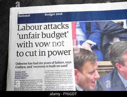 Labour attacks 'unfair budget' with vow not to cut in power Guardian newspaper article London UK 17th March 2016 Stock Photo