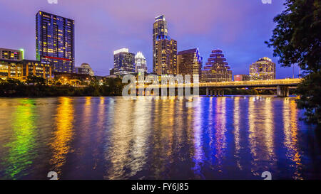City lights come on in Austin, Texas downtown skyline at night Stock Photo