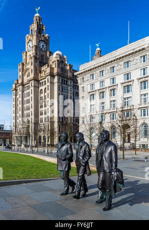 Andrew Edward's sculpture of The Beatles in front of the Royal Liver and Cunard buildings, Pier Head, Liverpool, England, UK Stock Photo