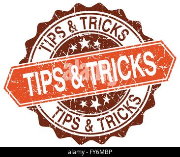 tips & tricks orange round grunge stamp on white Stock Vector