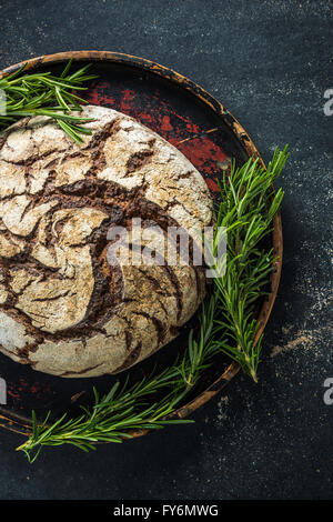 Whole loaf home baked rye bread, artisan bakery Stock Photo