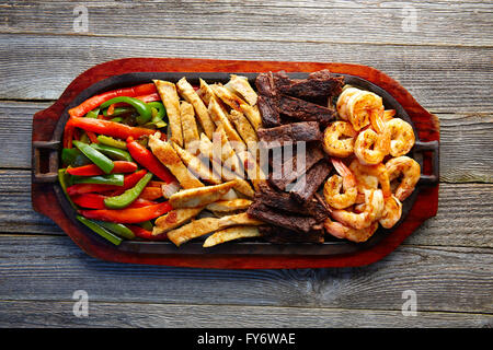 Mexican combo beef and chicken fajitas with shrimp Stock Photo