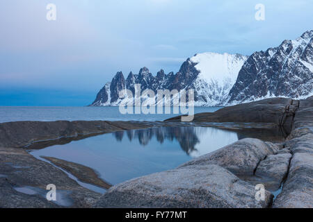 Rugged Coast of an Arctic Fjord in Norway Stock Photo
