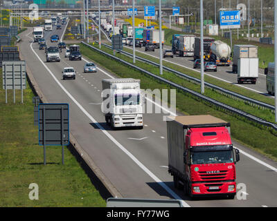 Lots of trucks traffic on the E19 near the Belgian-Dutch border at Hazeldonk (looking towards the Netherlands) Stock Photo