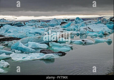 The Jokulsarlon glaciar lagoon in Iceland with dark clouds Stock Photo