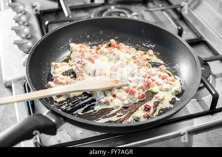 cooking cream bacon cubes chopped pan Stock Photo