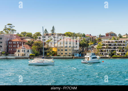 Sailboats moored in the Manly district bay on Summer day, near Sydney, Australia
