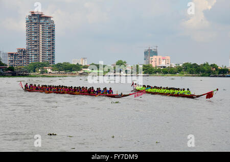 Thai people join with Long boat Racing at Chaopraya river in Nonthaburi, Thailand Stock Photo