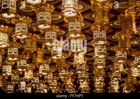 many decorative lamp hanging from the ceiling of the monastery, Buddha Tooth Relic Temple in China Town, Singapore Stock Photo