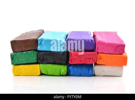 colorful modeling clay or plasticine for children on white background Stock Photo