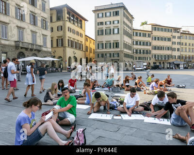 Students art drawing on Piazza Santa Maria Novella, Florence, Tuscany, Italy Stock Photo