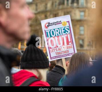 London, United Kingdom - April 16, 2016: Anti-Austerity March. All focus in on the sign by the Socialist Party that we should st Stock Photo