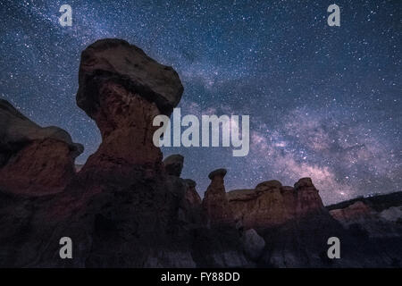 Rock spires silhouetted against the Milky Way on a dark night in eastern Colorado Stock Photo