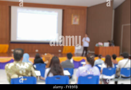 Abstract blurred at Business photo of conference hall or seminar room with attendee background Stock Photo