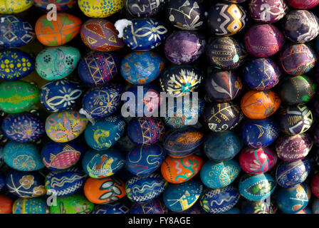 Easter eggs forming a shape on snow Stock Photo
