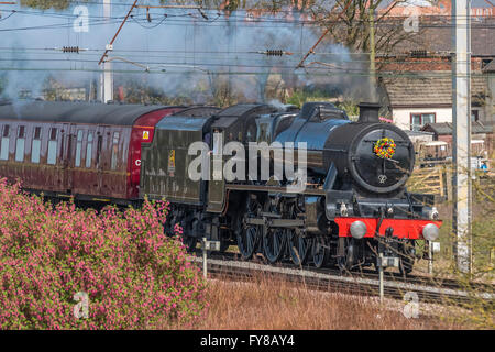 LMS Jubilee Class 6P 4-6-0 no 45690 Leander steam locomotive at speed with the Salopian Railtour passing Winwick junction Stock Photo