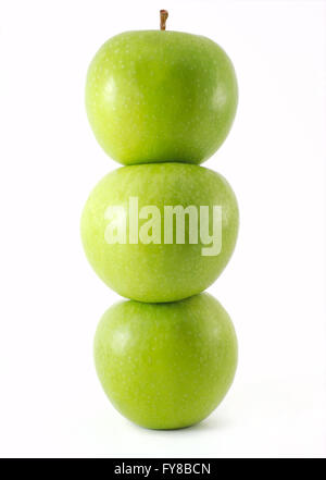 Fresh green apples stacked on top of one another Stock Photo