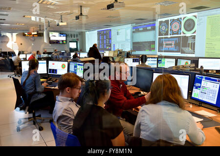 Inside the ATLAS building control room at CERN where physicists and students control detectors used to discover the Higgs boson. Stock Photo