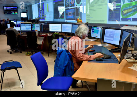 Physicist in control room of ATLAS detector at CERN. Stock Photo