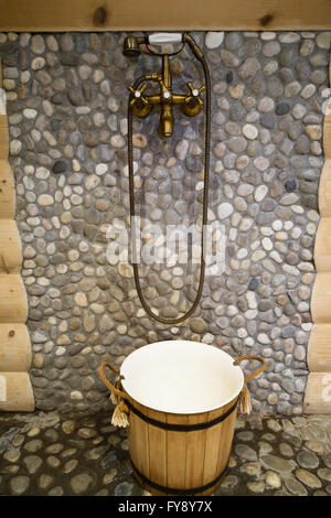 Beautiful bronze shower in a warm bath Stock Photo