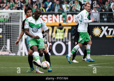 Wolfsburg, Germany. 23rd Apr, 2016. Wolfsburg's Joshua Guilavogui (front) and Augsburg's Ja-Cheol Koo in action during the German Bundesliga soccer match between VfL Wolfsburg and FC Augsburg at Volskwagen arena in Wolfsburg, Germany, 23 April 2016. PHOTO: PETER STEFFEN/dpa (EMBARGO CONDITIONS - ATTENTION: Due to the accreditation guidlines, the DFL only permits the publication and utilisation of up to 15 pictures per match on the internet and in online media during the match.) Credit:  dpa/Alamy Live News Stock Photo