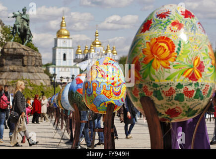 Kiev, Ukraine. 23rd Apr, 2016. Ukrainians visit 'Easter eggs festival' at Sophia Square. 374 artists from different regions of Ukraine painted giant Easter eggs, which were exhibited at Sophia Square in Kiev, on the eve of Orthodox Easter at 01 May. © Vasyl Shevchenko/Pacific Press/Alamy Live News Stock Photo
