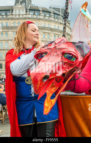 London, UK. 23rd April, 2016. St Georges day celebration at Trafalgar Square. Feast of St Georges festival. Big red interactive puppet dragon. Credit:  Elena Chaykina/Alamy Live News Stock Photo